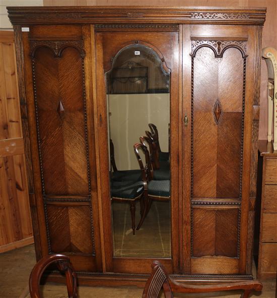 A 1930s oak 3 door wardrobe